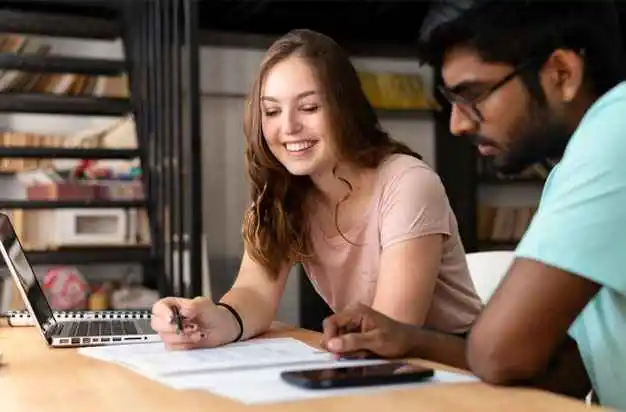 Bunch of students going through the scholarship document